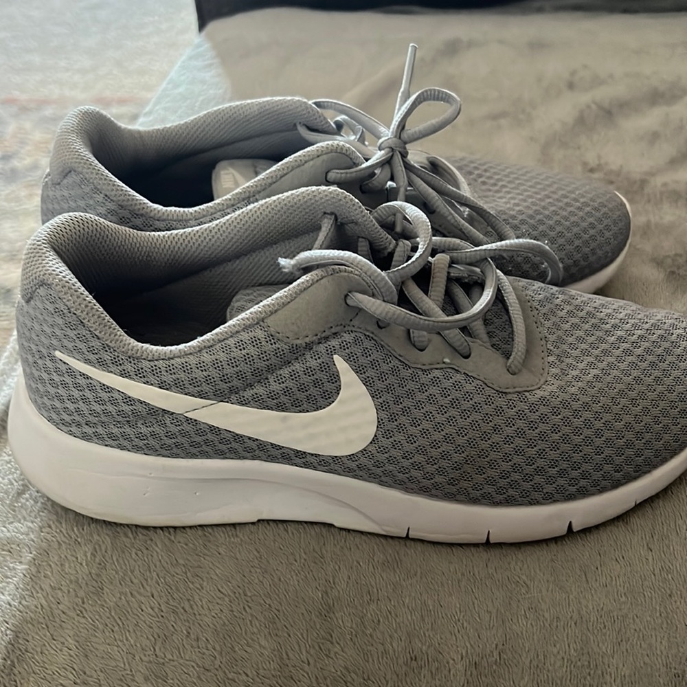 Kids gray Nike shoes